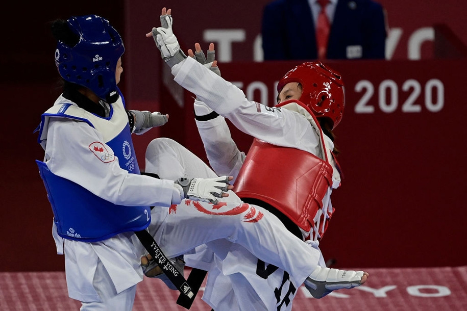 Ch&ugrave;m ảnh: Kim Tuyền vượt trội đối thủ Canada ng&agrave;y ra qu&acirc;n Olympic