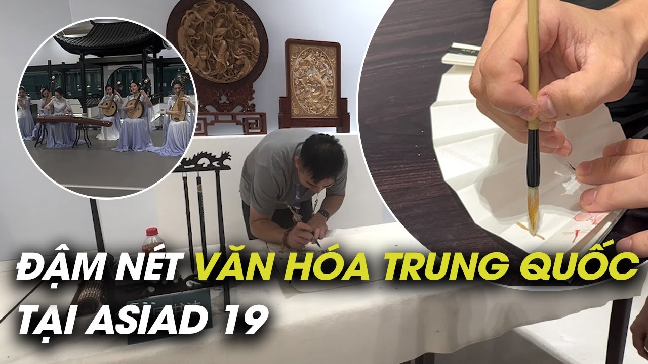 Nghe đàn tranh, tập làm quạt, viết thư pháp ở khu báo chí ASIAD 19