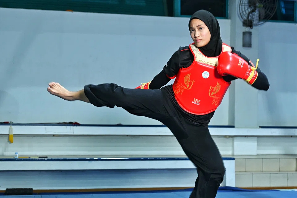 SEA Games 2025: Siti Khadijah Shahrem là nữ vận động viên wushu sanda đầu tiên của Singapore giành huy chương SEA Games 2025: Siti Khadijah Shahrem là nữ vận động viên wushu sanda đầu tiên của Singapore giành huy chương