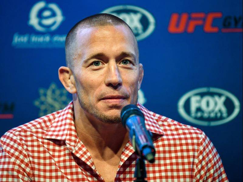 George St-Pierre vẫn chần chừ giữa ý định nghỉ hưu và khả năng trở về - Ảnh 1. George St-Pierre vẫn chần chừ giữa ý định nghỉ hưu và khả năng trở về - Ảnh 1.