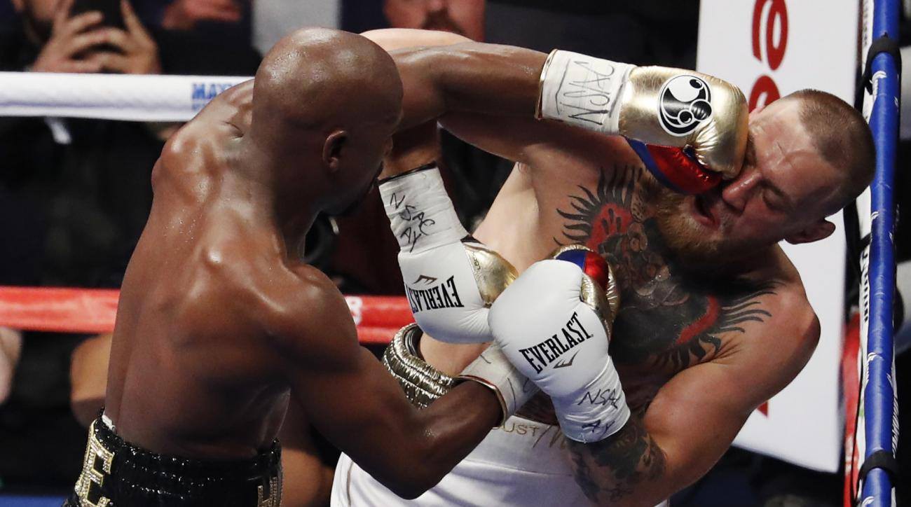 Mayweather hạ knockout McGregor, toàn thắng 50 trận!