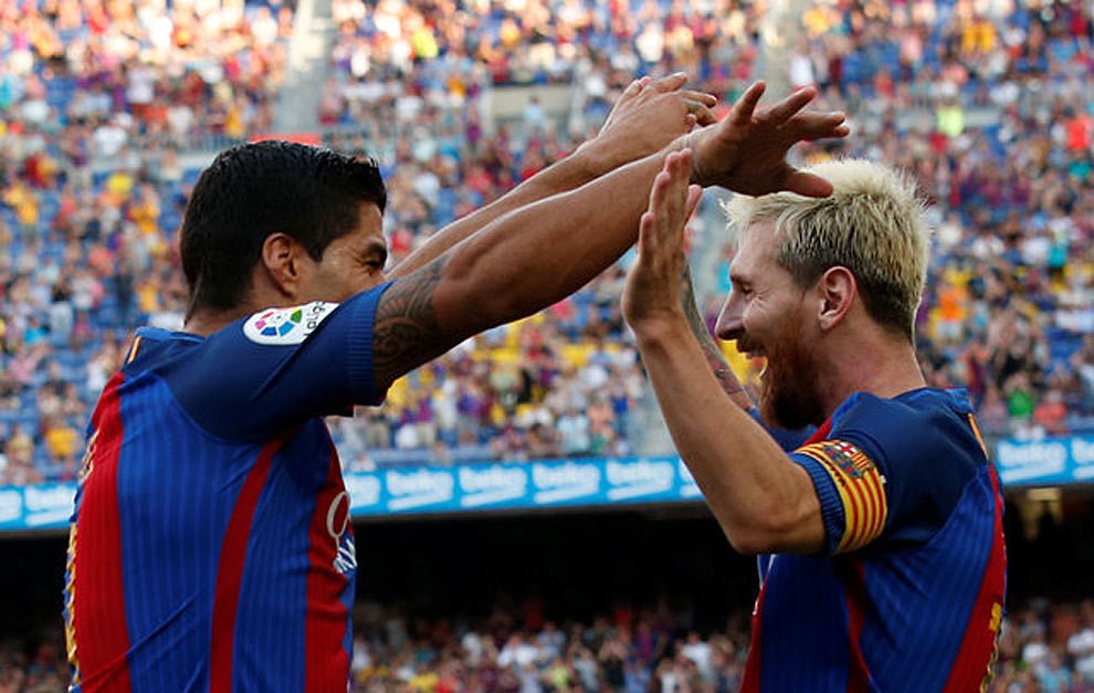 Suarez thành công khi “sống chung” với Messi