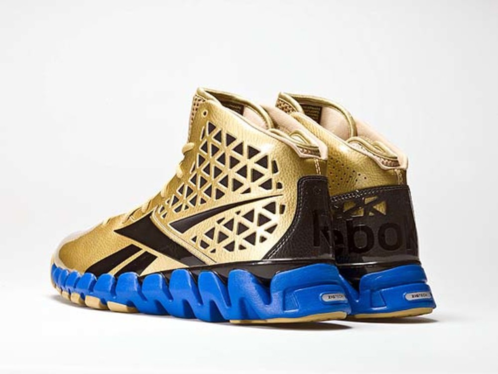 Màu vàng đồng đẹp mắt của Reebok Zig Slash “Gold Rush”. Màu vàng đồng đẹp mắt của Reebok Zig Slash “Gold Rush”.