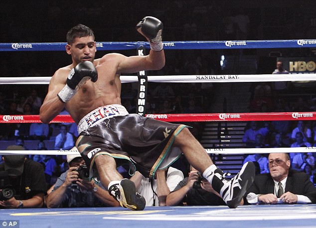 "King" Khan gục ngã ở hiệp 6 trước Saul Alvarez